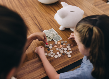 Parents in Las Vegas evaluating Million Dollar Baby vs. 529 Plan for their child’s future financial security