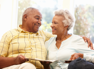 “Senior woman receiving home care with a nurse—representing long-term care insurance that supports aging in place.”