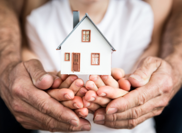 “Family holding hands representing protection through different long-term care insurance products.”