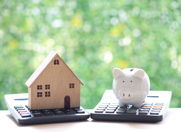 Calculator and tax form showing savings from long-term care insurance incentives.”