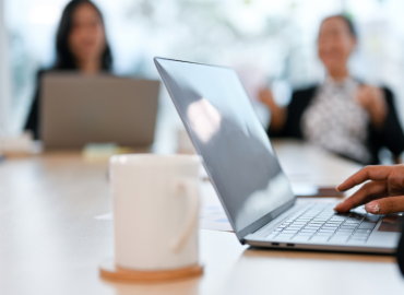 “Financial advisor helping senior couple explore alternatives after being declined for long-term care insurance.”